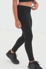 Produktfoto Skinnifit lange schwarze Mädchen Leggings aus Baumwolle mit Elasthan