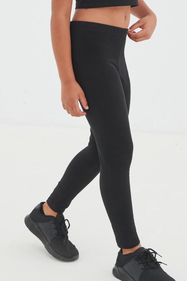 Produktansicht: Skinnifit lange schwarze Mädchen Leggings aus Baumwolle mit Elasthan Produktansicht: Skinnifit lange schwarze Mädchen Leggings aus Baumwolle mit Elasthan